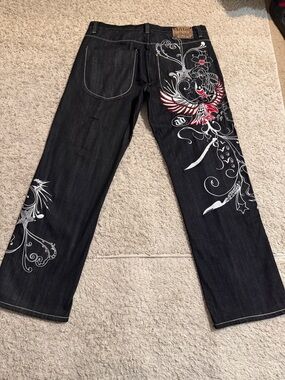Vintage Artful Dodger Jeans with Red & White Embroidered Accent.